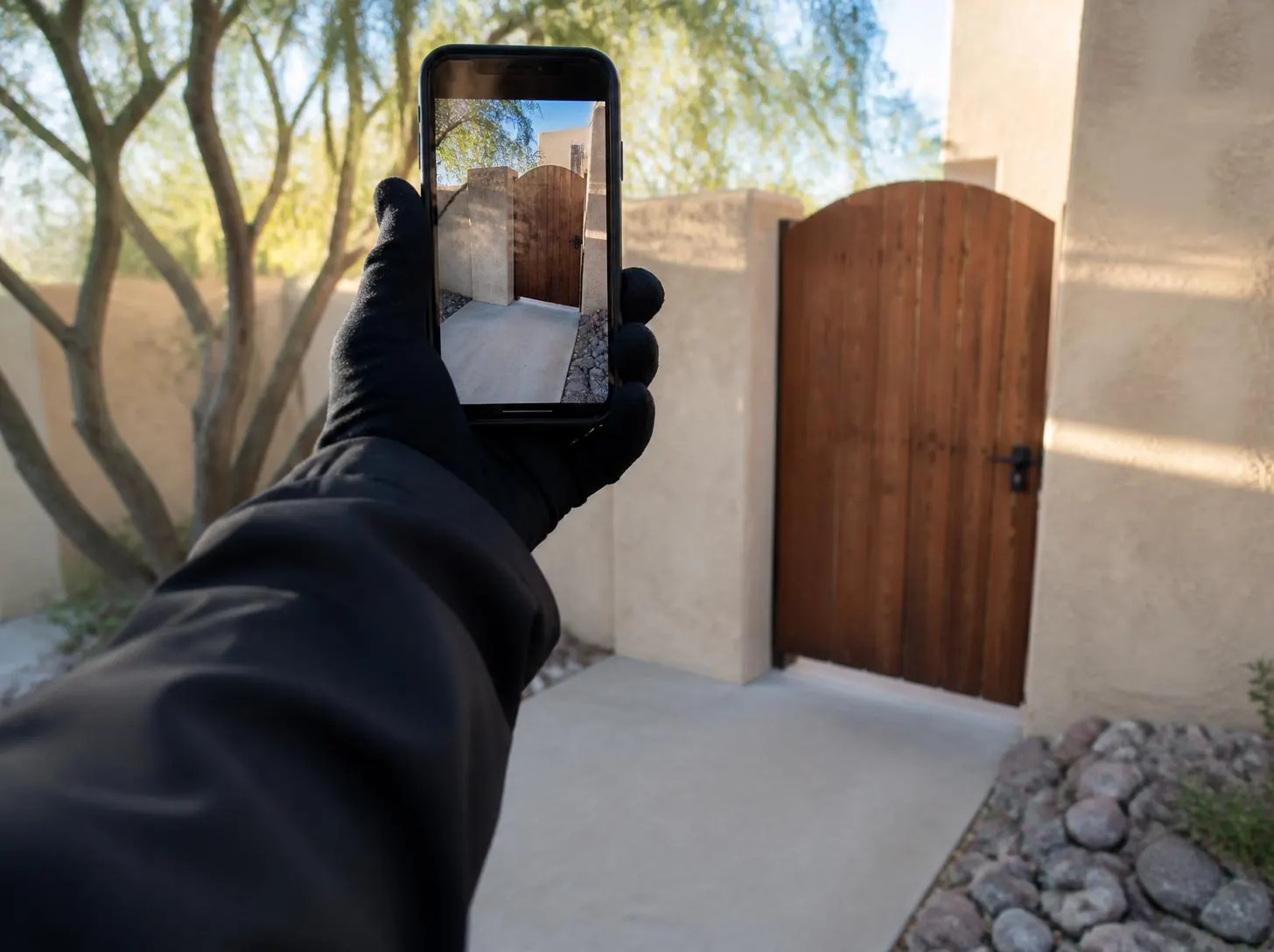 Taking a photo of a closed, latched gate after service